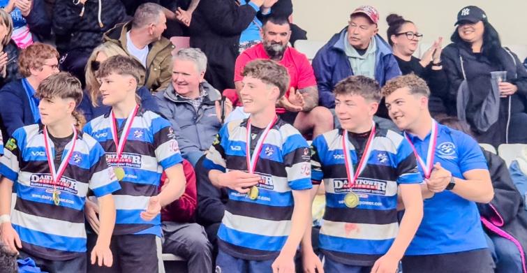 Dewi celebrates with his Fishguard and Goodwick pals