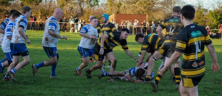 Llangwm defend well as The Blues attack. Picture William John