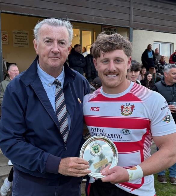 Sponsor Huw Hughes and winning captain Dan Jenkins