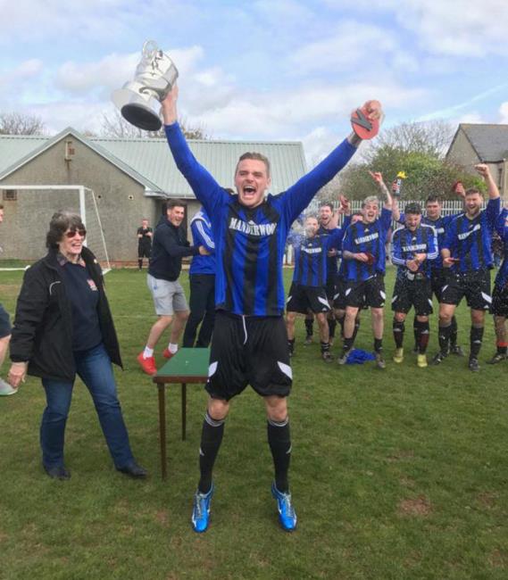 Nicky Woodrow and Hakin teammates celebrate another league title