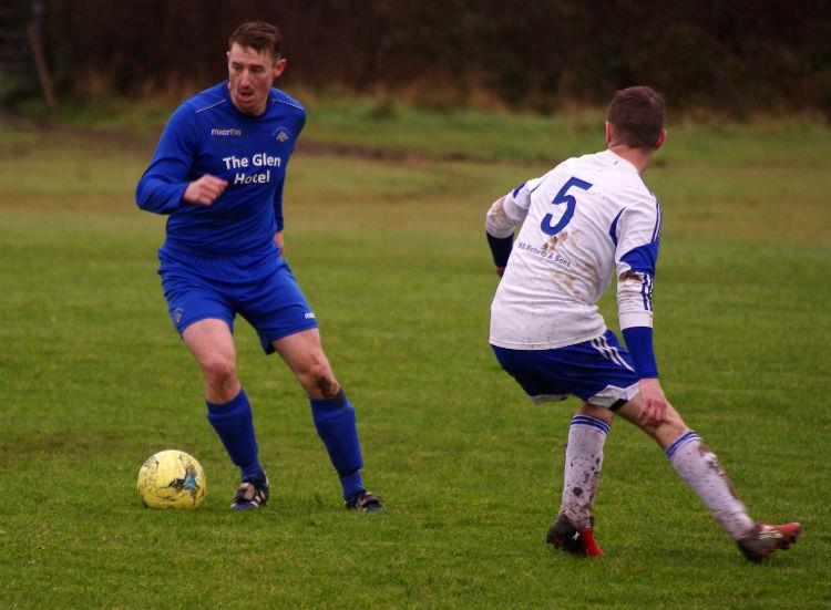 Ashley Beck controls matters in midfield for Merlins Bridge