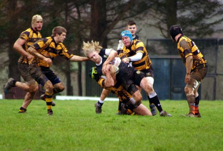 Quins skipper Thomas Doyle on the end of a crunch tackle against The Wasps