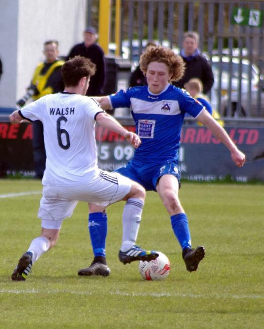 Bluebirds’ Greg Walters puts in a strong tackle