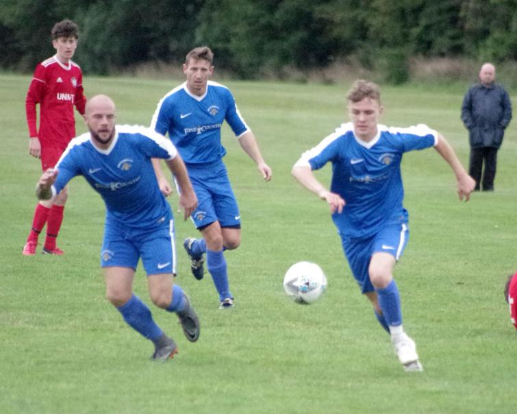 Goal scorer Will Haworth attacks for the Wizards