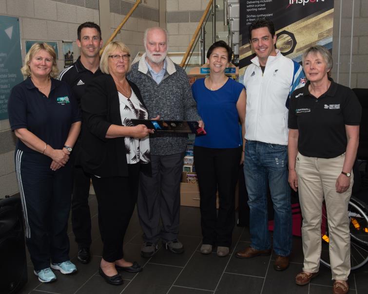 Our picture shows the insport silver award being presented by Michelle Daltry