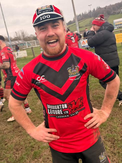 Gwion Jones celebrated his Tenby United cap for 100 games