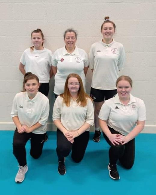 Sarah in the Neyland Ladies indoor cricket team