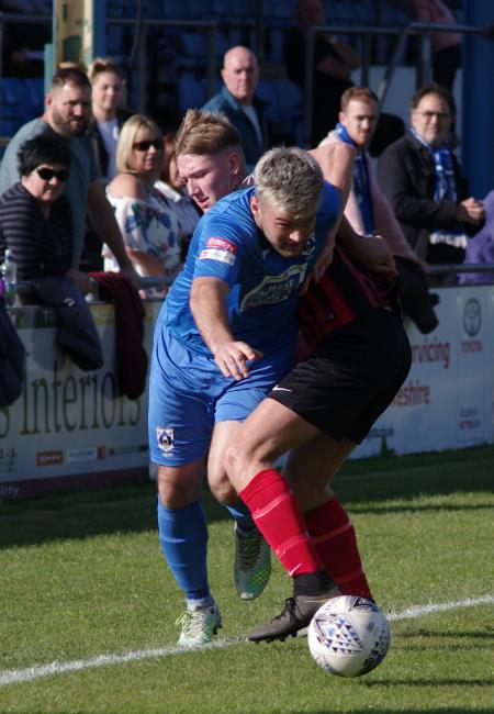 Ashley Bevan turns his marker