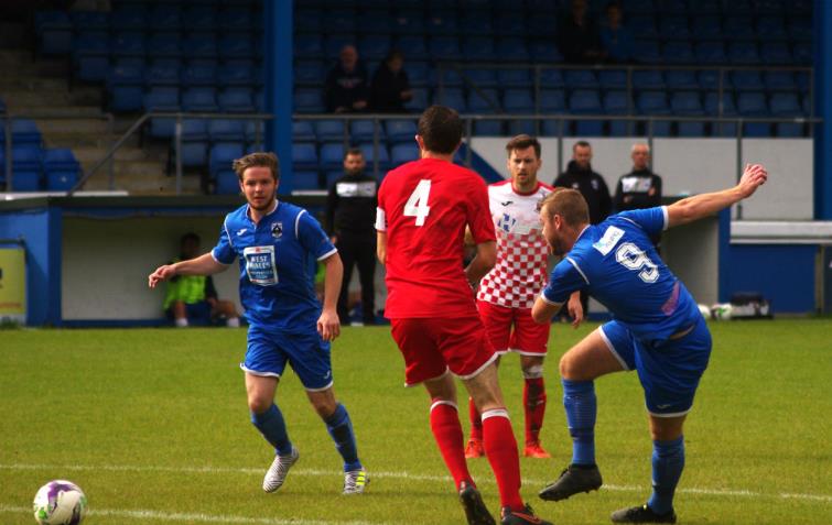 Joe Leahy tries a snap shot for Haverfordwest County