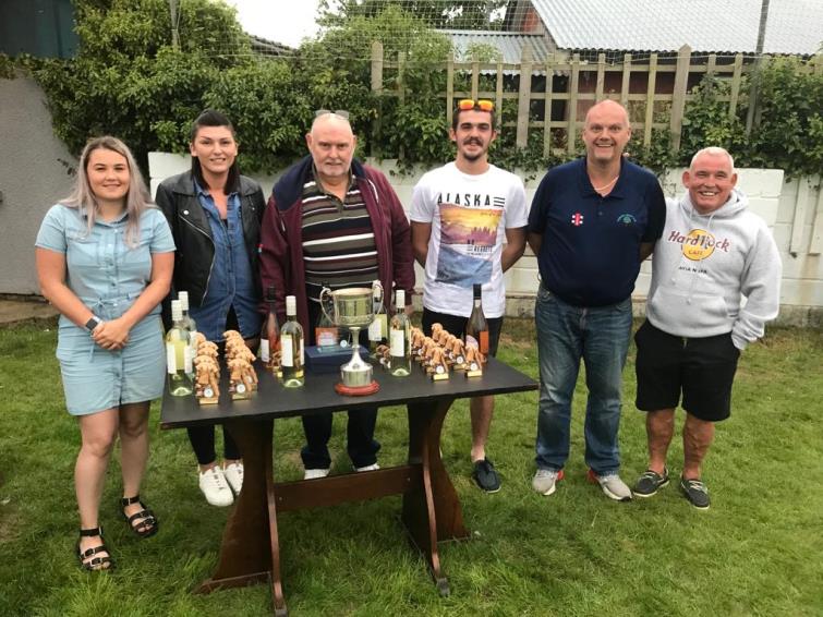 Richard Howell with the Morris Family at a recent final