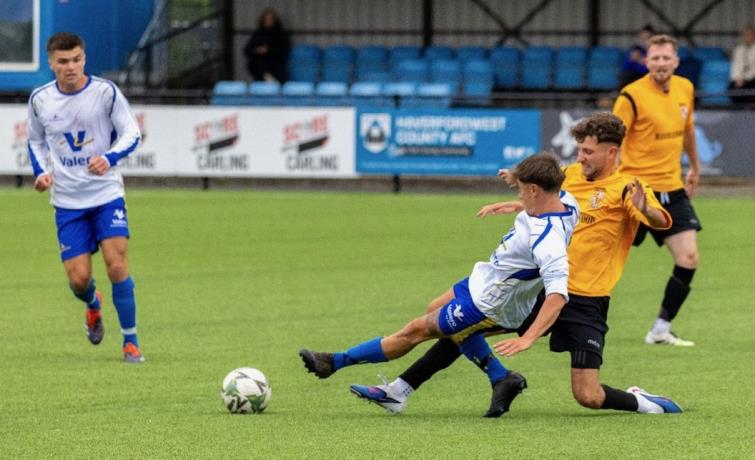 A typical midfield tackle