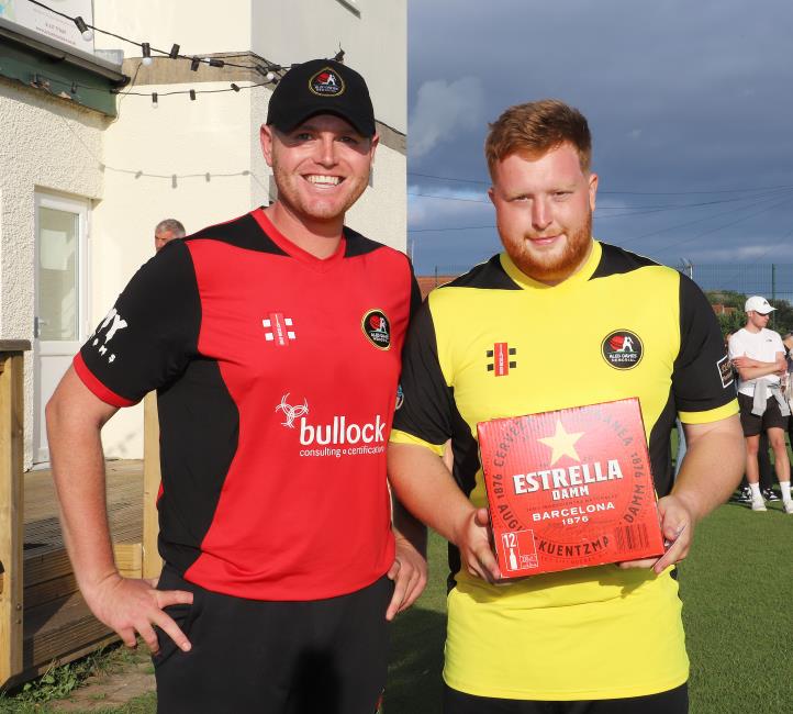 Tom Davies presents Harry Thomas with his prize for winning Man of the Match