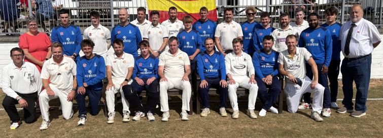The combined teams at tea time