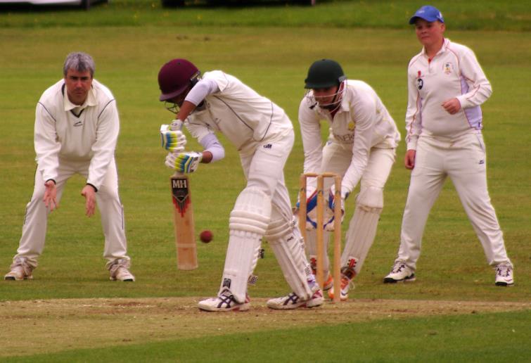 Nitin Mathias plays defensively for Haverfordwest