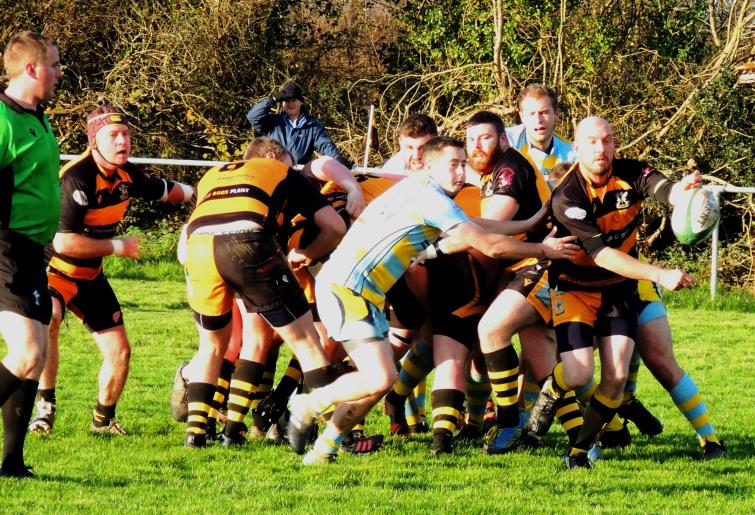 Ian Griffiths gets the ball away for Llangwm