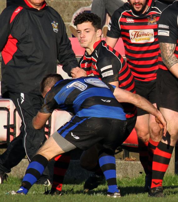 Jordan Asparassa is tackled. Picture by Susan McKehon.