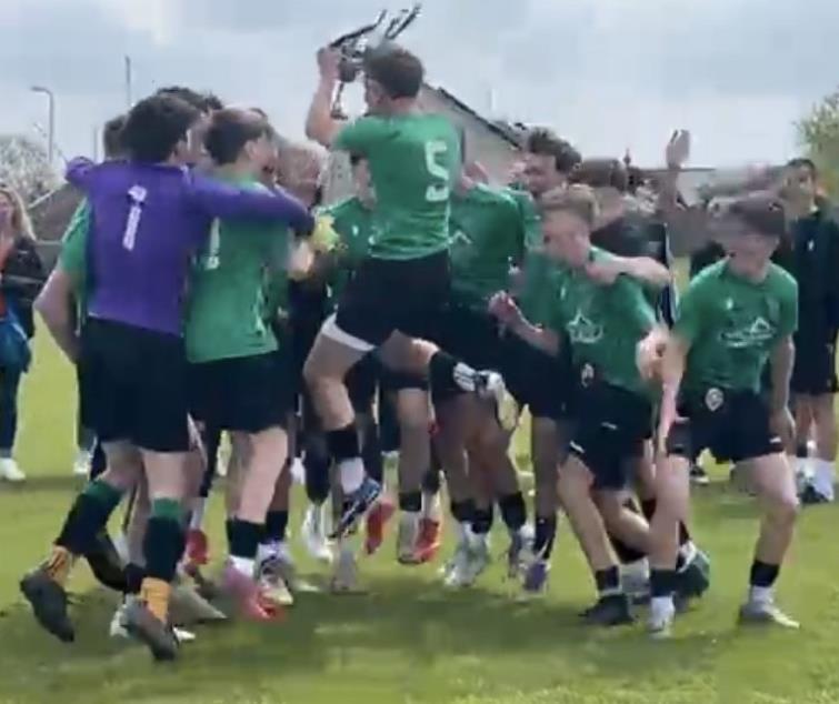 Celebrating a football trophy
