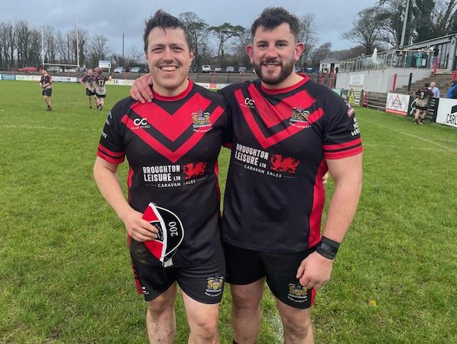 Ethan Morgan (playing in his 200th game for Tenby) and man of the match Hywel Baker. Picture Fraser Watson