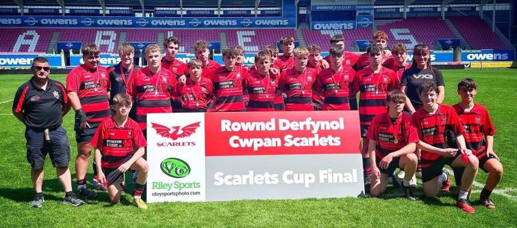 Ollie leads his team to the Cwpan Scarlets big day
