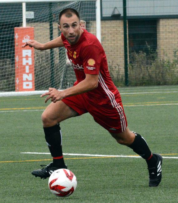 Marcus Griffiths scored two late goals to earn Carew victory at Tenby