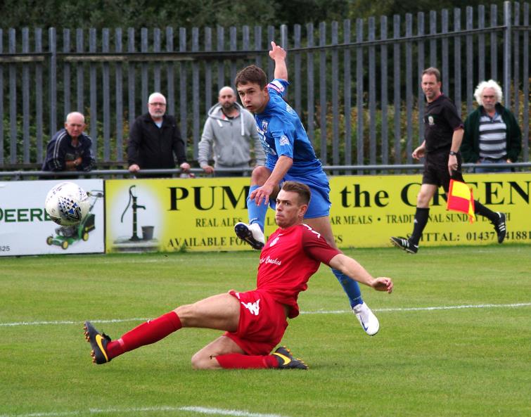Ben Fawcett scores for Haverfordwest County in their win at home against Lido
