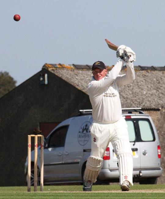 Steve Lewis blasts a six for Lawrenny - Brian McKehon