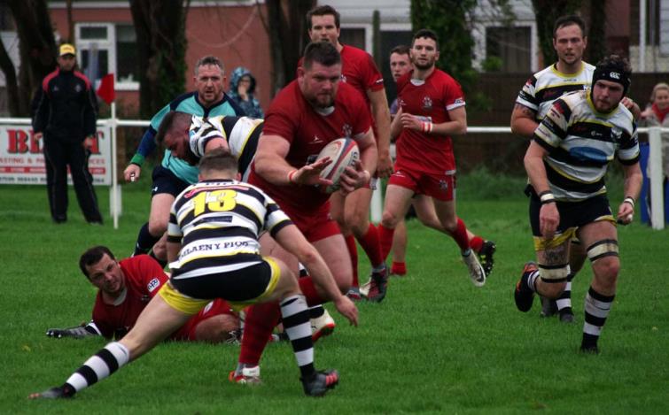 Sam Smith - the Pembroke No 8 powers over for a try against Tumble