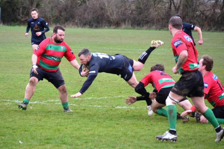 Veteran winger Delme Bateman in full flight for Neyland