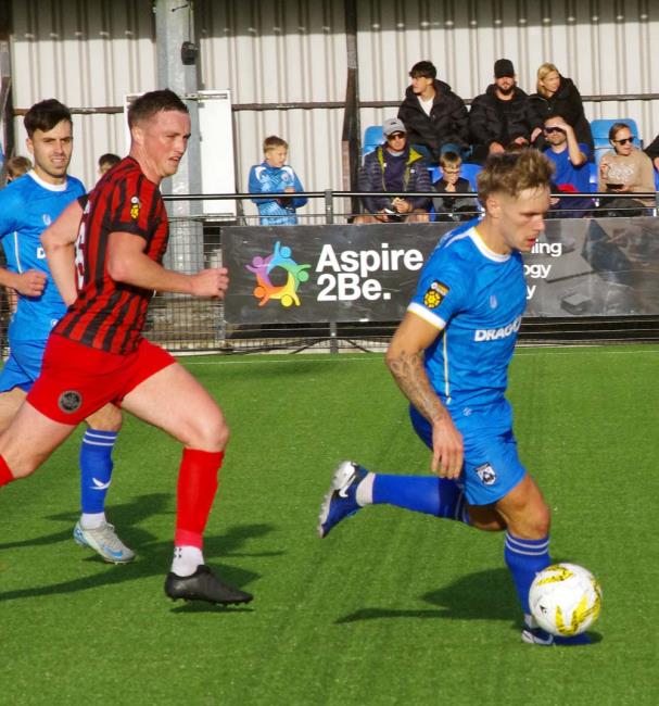 Haverfordwest County skipper Corey Shephard drives forward from midfield. Picture Gordon Thomas