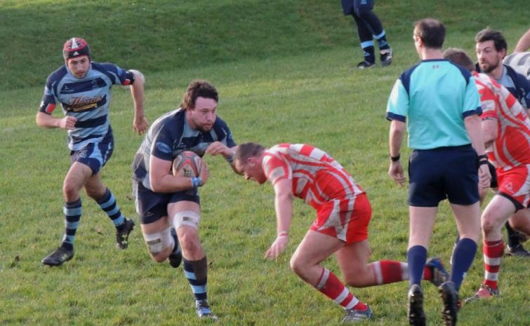 Callum Tree on a charge, supported by Lewys Gibby