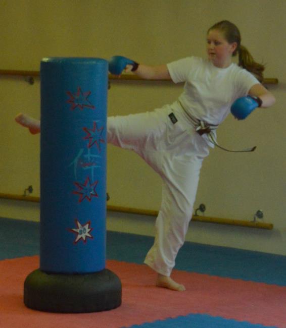 Cassie uses a swing kick