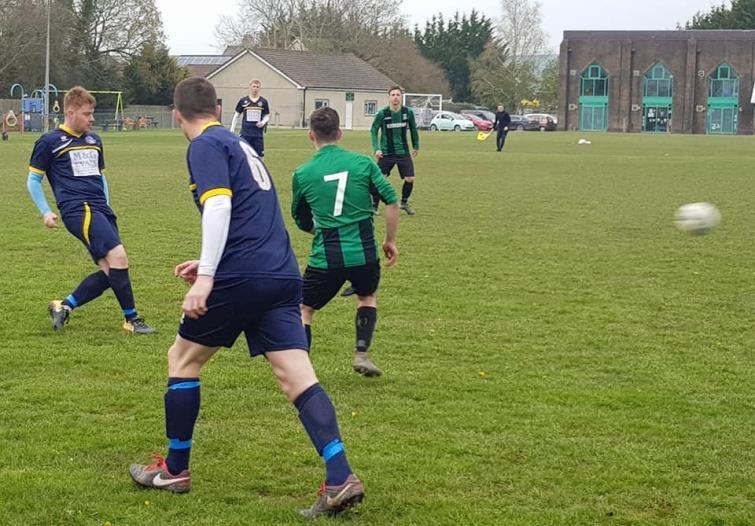 Ceri Phillips plays a through ball