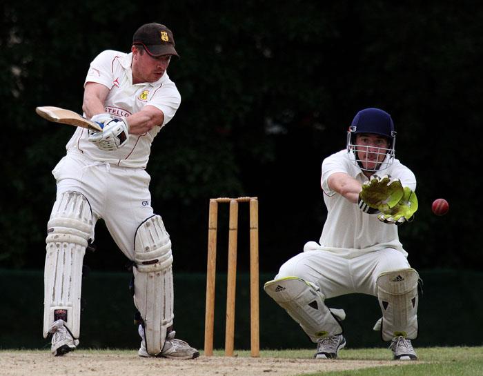 Chris Cole hits a boundary for Carew II