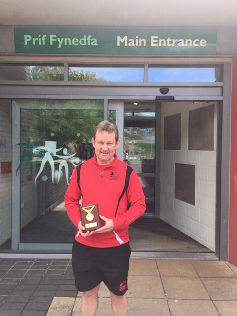Chris Barker with award