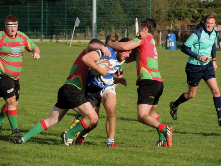 Chris Shousha breaks out of two tackles on his way to the line