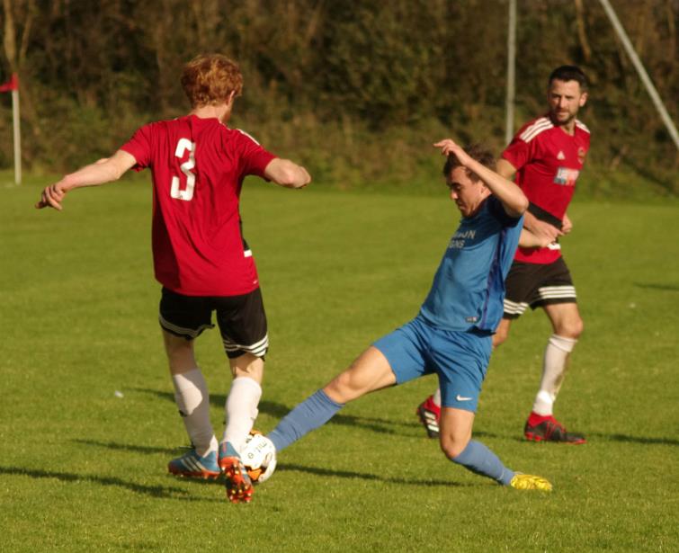Action from Knock Field where Clarbie Road lost at home to the Swifts