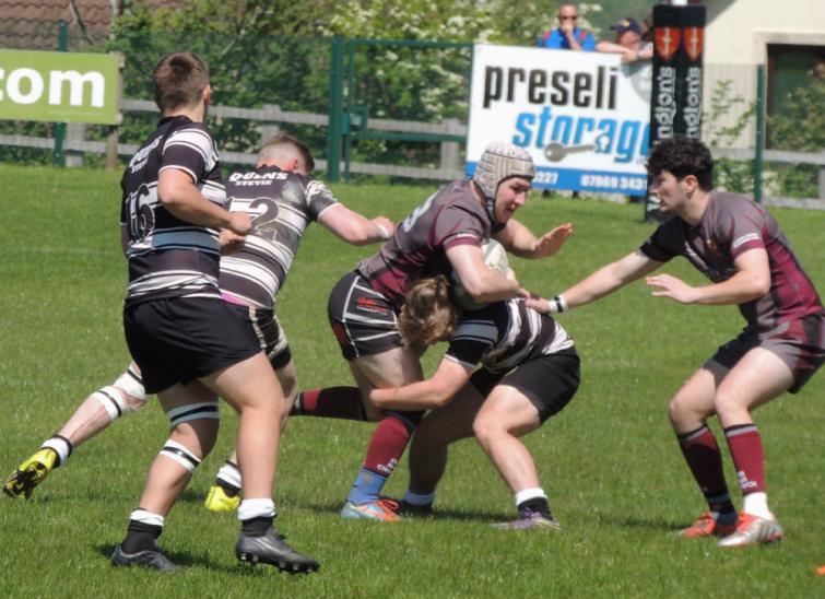 Crymych centre Josh Hewins in action