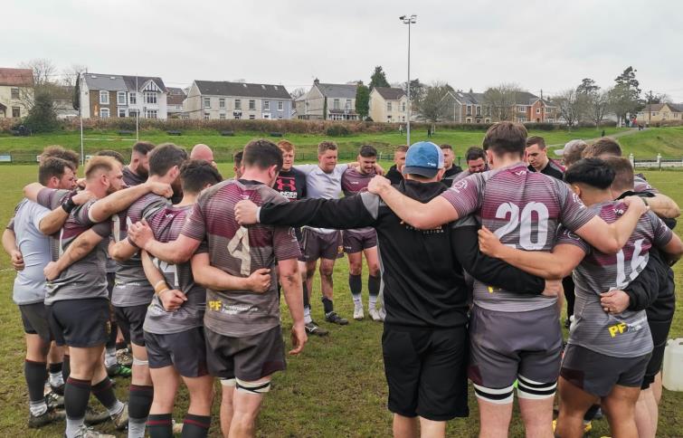 Crymych get into their pre-match Huddle