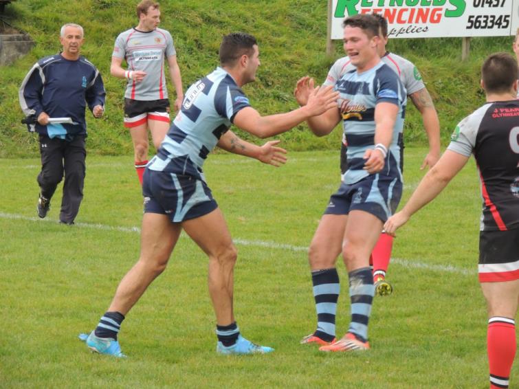 And is congratulated by a team mate!