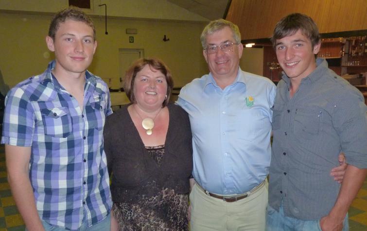 Andrew a while ago with parents Graham and Irene, plus brother James