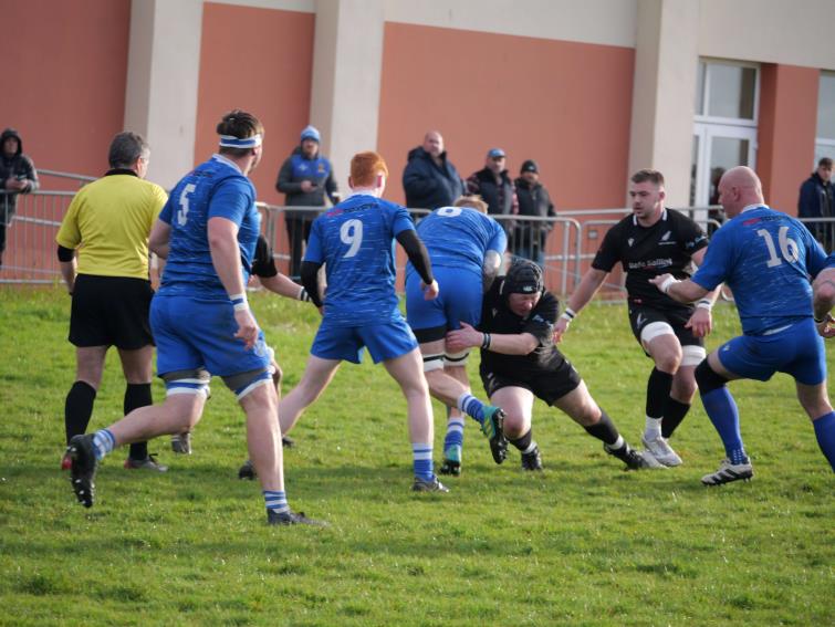 Andrew Slark puts in a big tackle