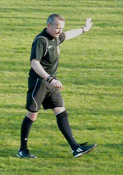 Angus Scourfield refereeing