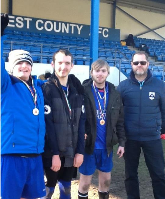 Lewis Davies (Bridgend Herons), Chris McFetrich (Bridgend Herons and Kerry Baker (Bridgend Herons) show off their medals.