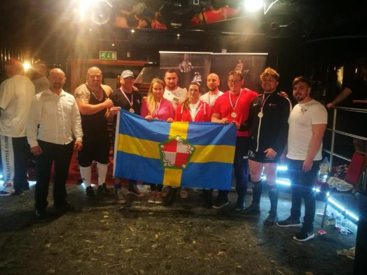 Aaron Hoskins flying the Pembrokeshire flag