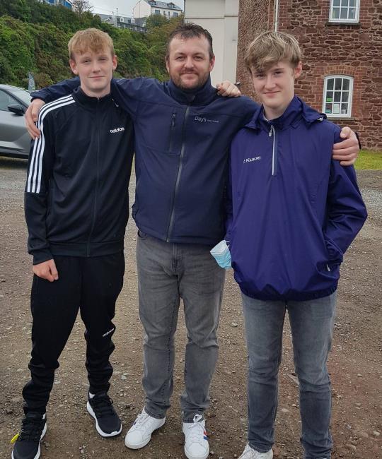 Rowland Adams with his sons