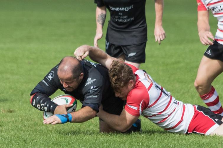 Adam Collins goes close for Neyland
