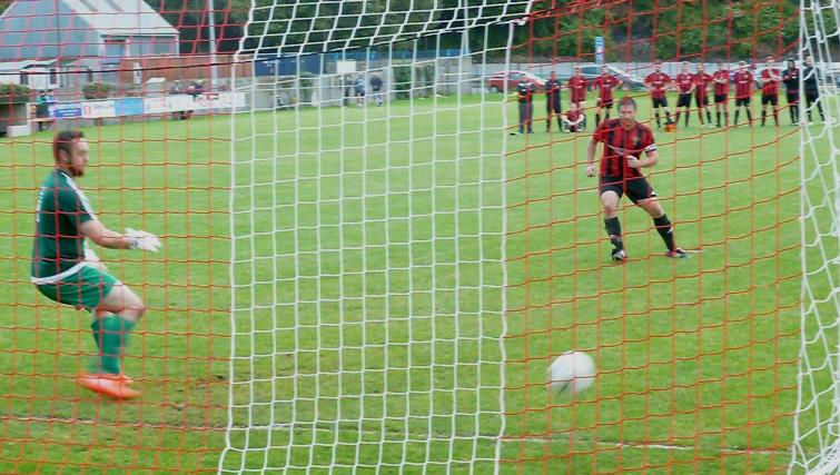 Adam Raymond scores