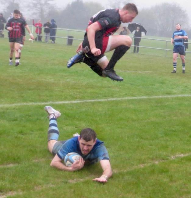 Guto Davies scores for The Otters as a defender leaps up. (Steve Thomas)