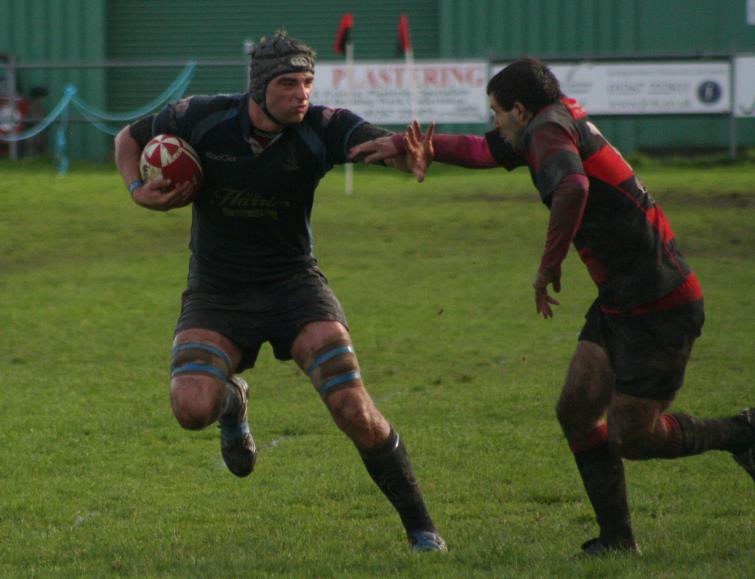 Alex Jenkins with a strong hand off