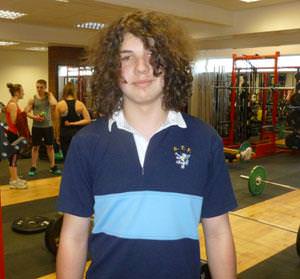 Alex is the quiet young man of local weight lifting!